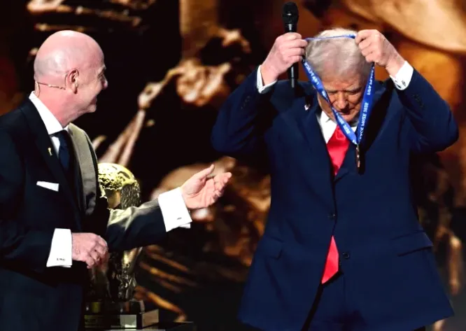 Trump celebrates winning FIFA's new peace prize with a big smile