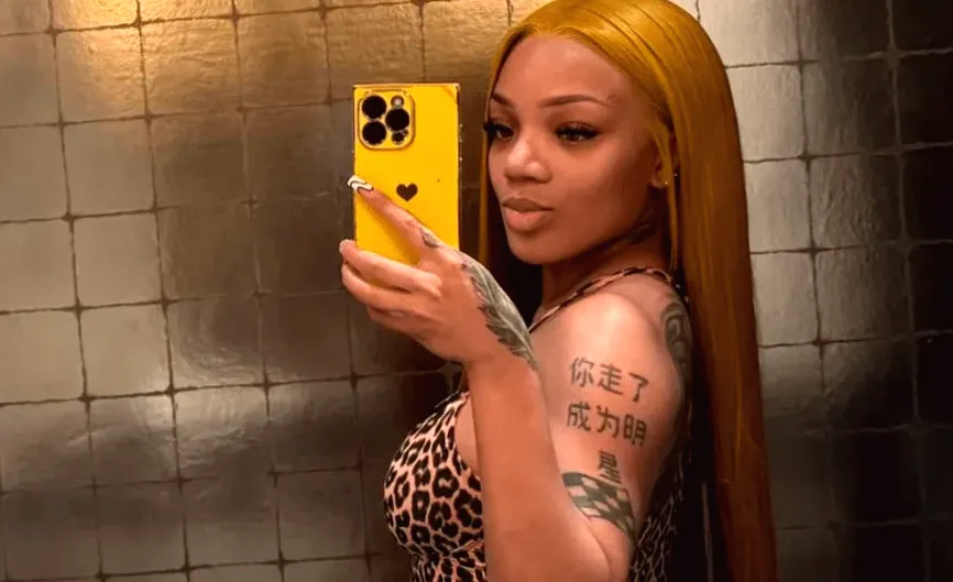 GloRilla Tiny Top Takes Risky Photos in Sheer Skirt