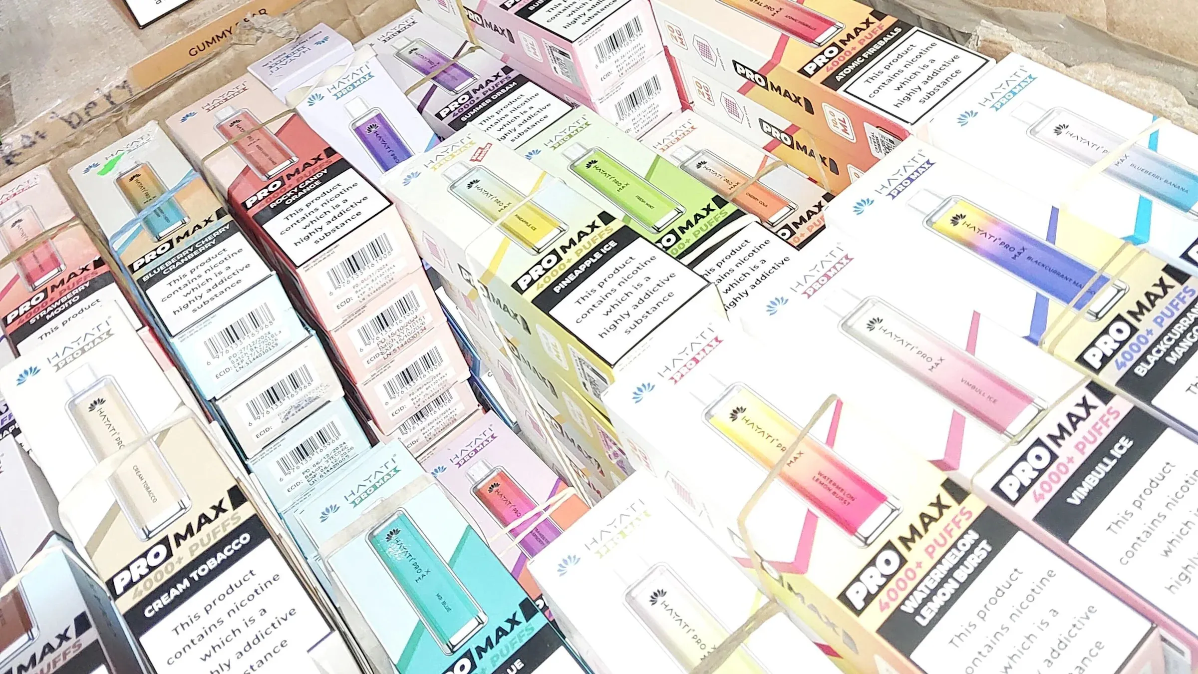 Cannabis vape pens and a machete discovered during shop raids