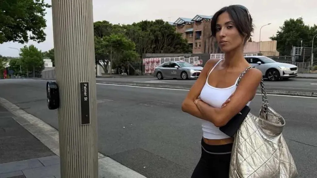 Bianca Censori's Sister Rocks Ultra Short Shorts and Cami Top in Photos