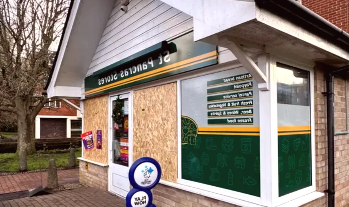 Local residents collect £4,000 in donations following vandalism of shop windows.