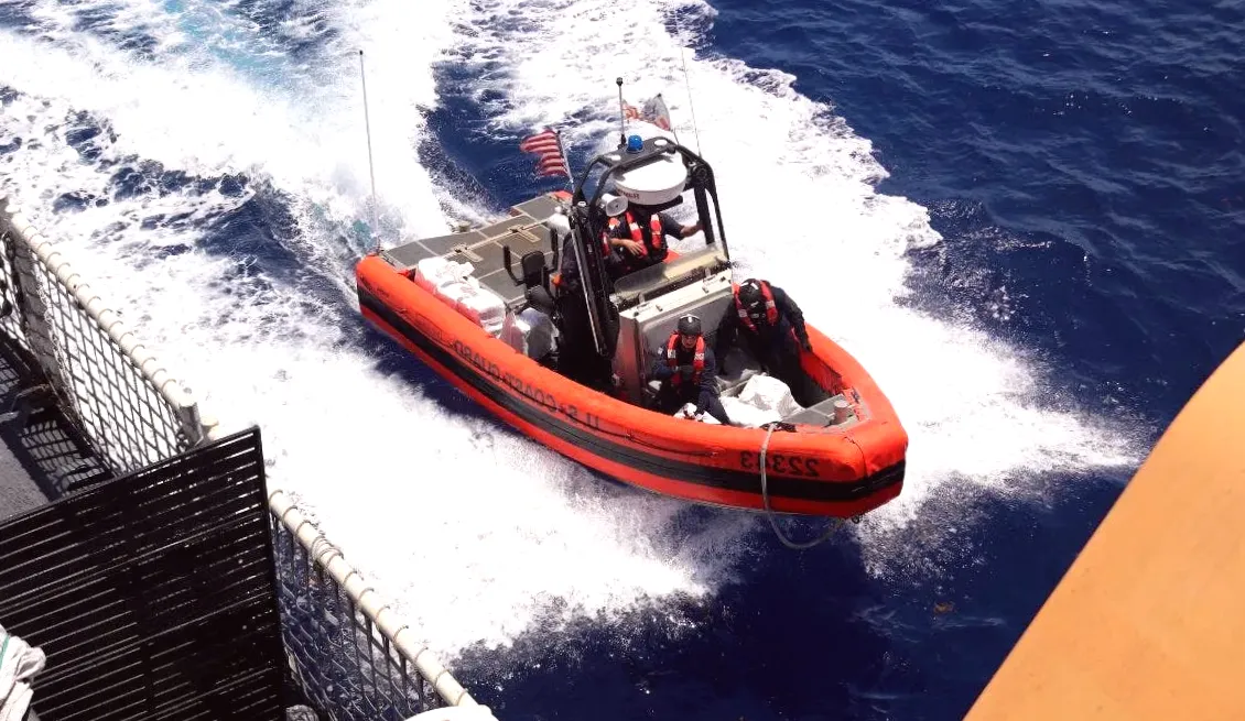 Exclusive video shows Coast Guard helicopter sniper disabling narco-boat engines