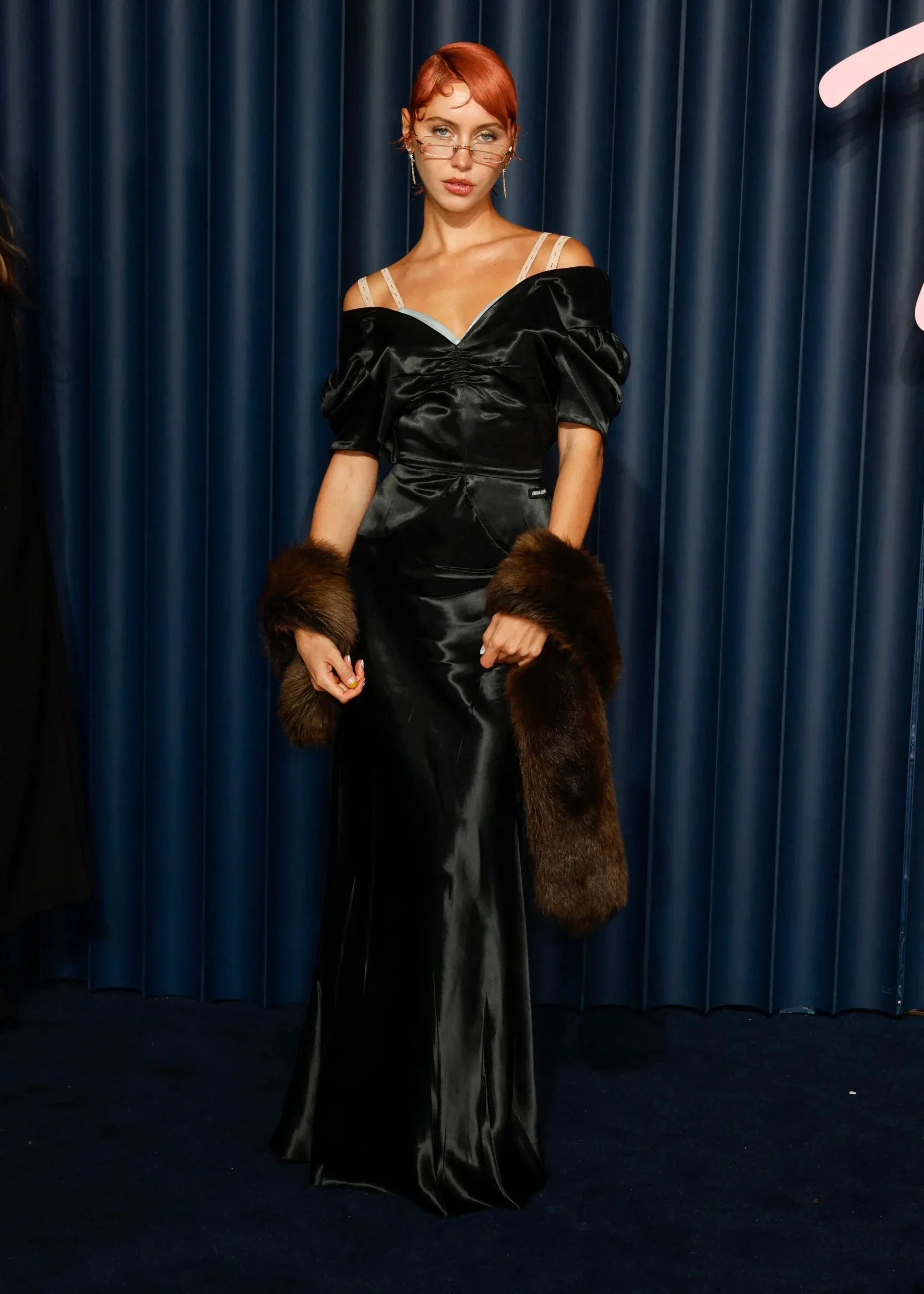 Iris Law Reveals Flirty Behind-the-Scenes Photos of Her Fiery Red Pixie Cut