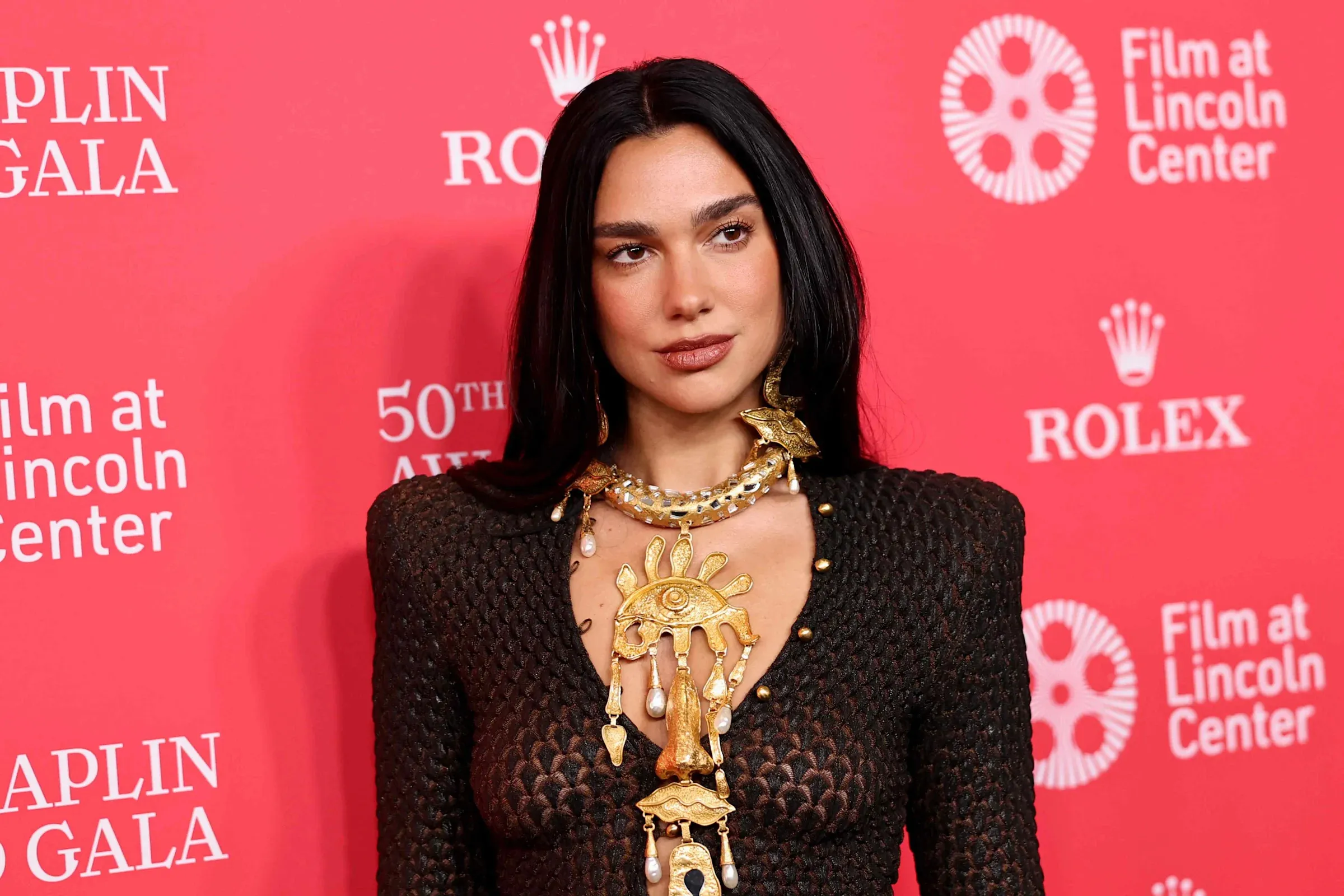 Dua Lipa Goes Pantless in Red Sequin Outfit with Cutouts and Gloves