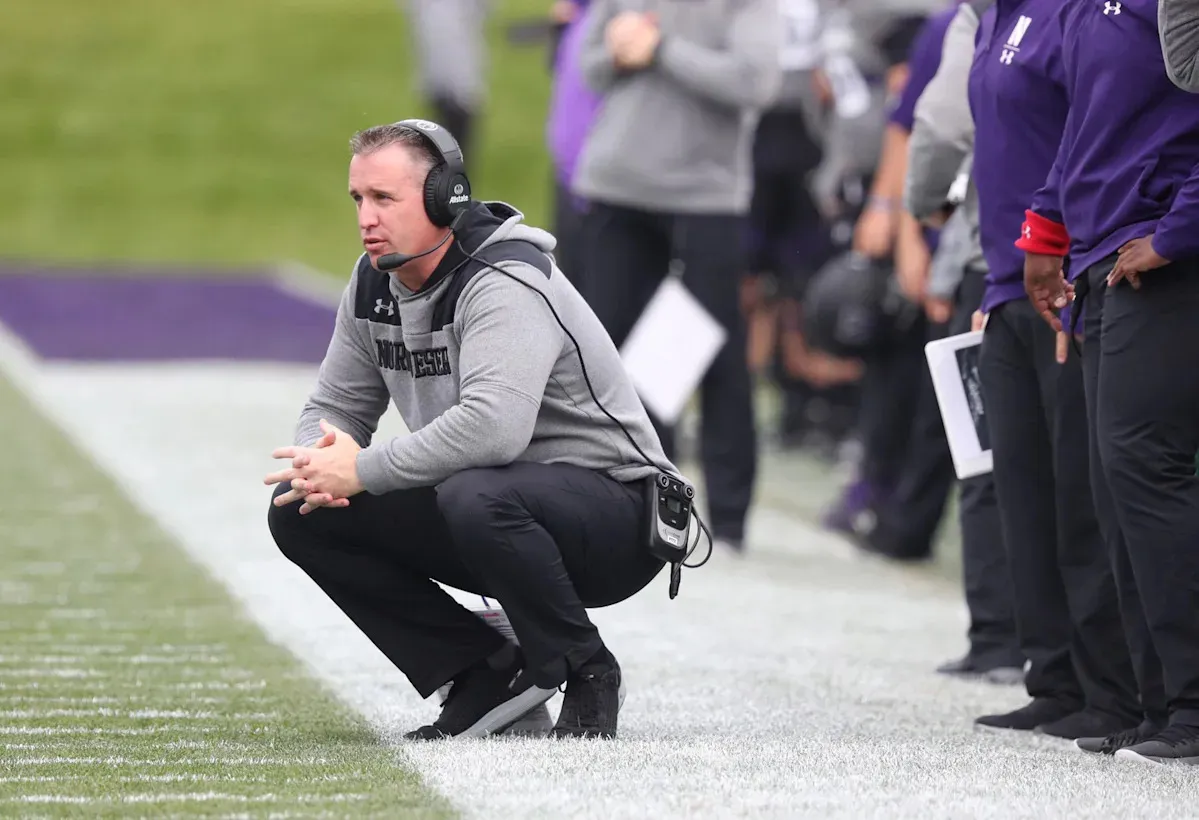 Michigan State officially hires former Northwestern coach Pat Fitzgerald as replacement for Jonathan Smith.