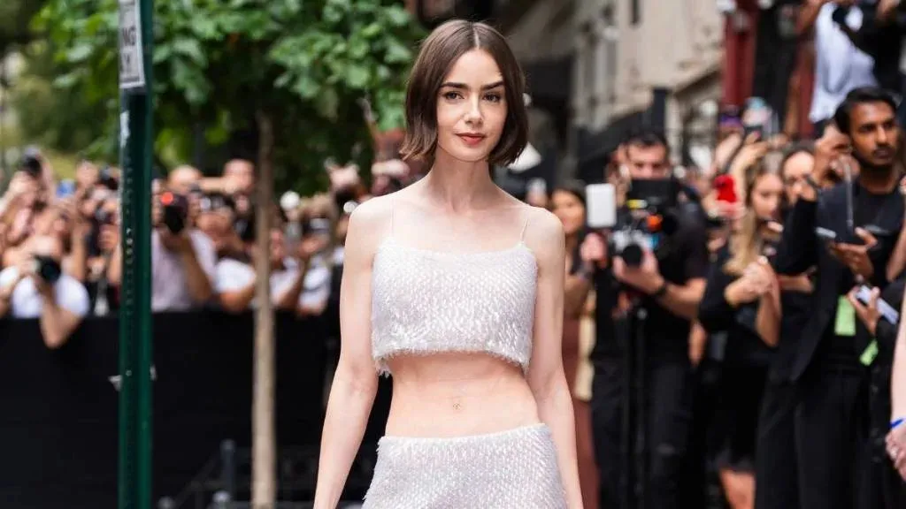 Lily Collins Looking Stunning in Sheer Lingerie as a 'Bombshell'