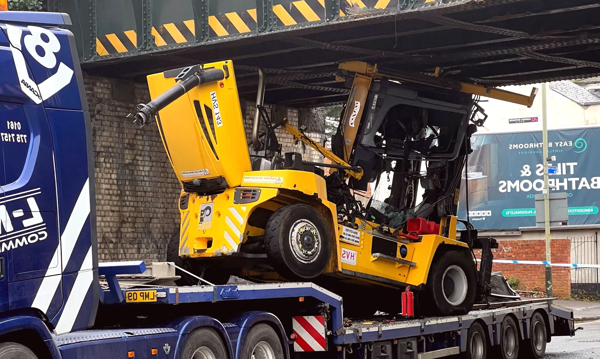 Road reopens following lorry getting stuck under bridge