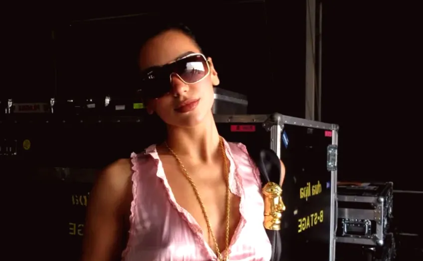 Dua Lipa's Pink Top Highlights Her Toned Midriff