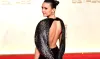 Nina Dobrev Wows in Backless Lanvin Dress with Stunning High Slit