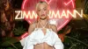 Rita Ora's Top Held up by Just a String in Micro Shorts Photo